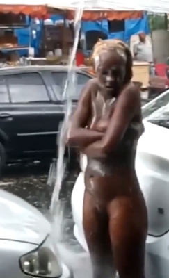 Curvy Lady Takes Her Shower Under The Rain in Public